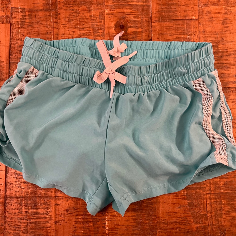 Fabletics teal running shorts